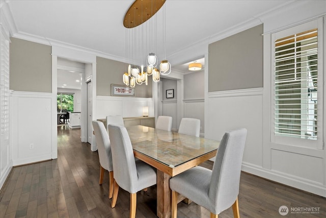 8132 NE 117th Pl, Kirkland, WA 98034 - dining area featuring a decorative wall, a chandelier, dark wood-style floors, a wainscoted wall, and crown molding