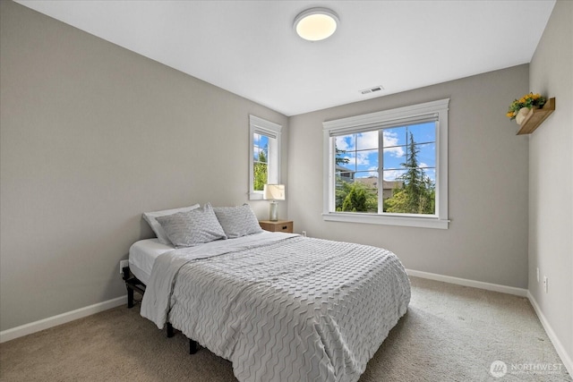 8132 NE 117th Pl, Kirkland, WA 98034 - bedroom featuring light colored carpet and baseboards