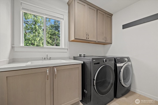 8132 NE 117th Pl, Kirkland, WA 98034 - laundry room featuring cabinet space, separate washer and dryer, and light tile patterned flooring