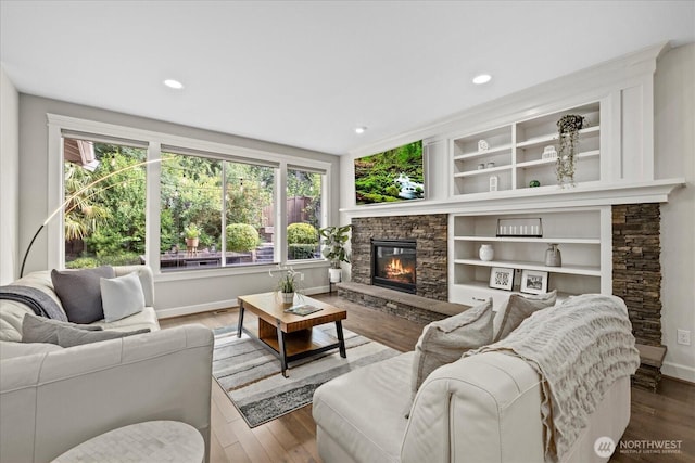8132 NE 117th Pl, Kirkland, WA 98034 - living room featuring a fireplace, wood finished floors, and recessed lighting