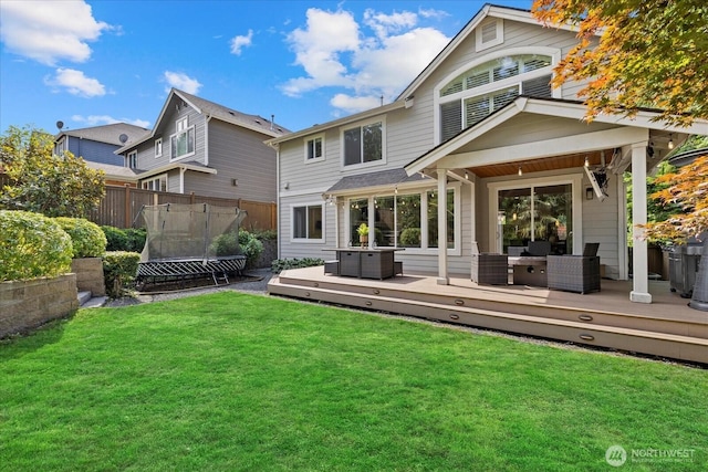 8132 NE 117th Pl, Kirkland, WA 98034 - back of property with a wooden deck and outdoor lounge area