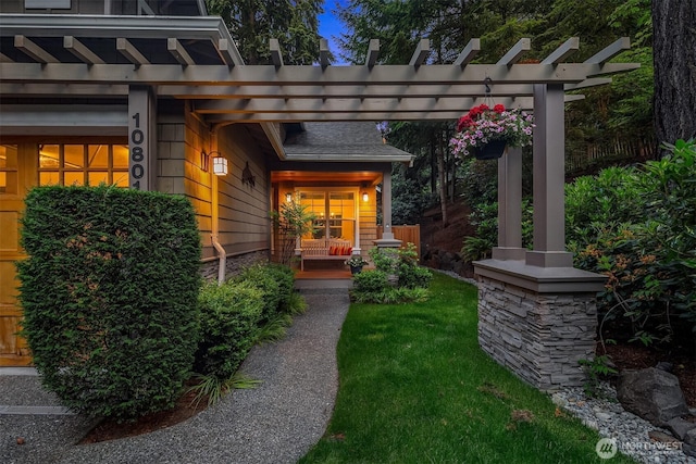10801 SE 28th St, Bellevue, WA 98004 - doorway to property featuring covered porch and a pergola