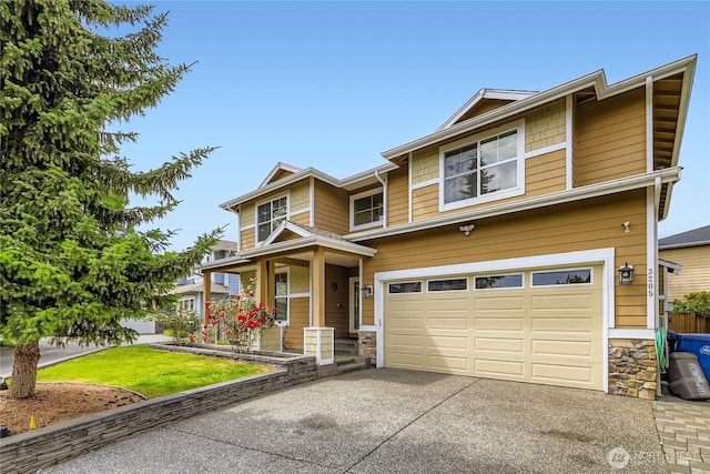3205 179th Pl SE, Bothell, WA 98012 - view of front of home with driveway, a garage, stone siding, and a front yard