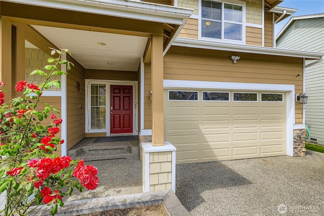 3205 179th Pl SE, Bothell, WA 98012 - view of exterior entry featuring an attached garage and asphalt driveway