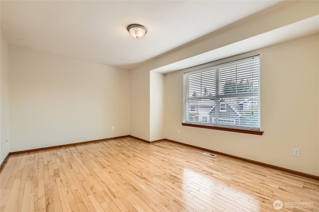 3205 179th Pl SE, Bothell, WA 98012 - spare room with hardwood / wood-style flooring