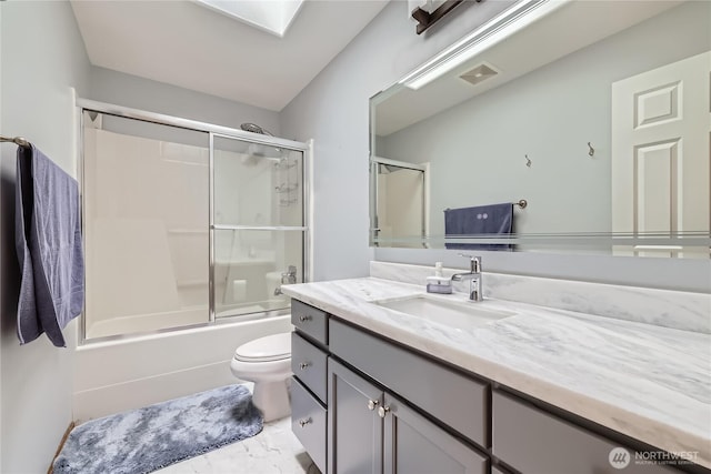 3205 179th Pl SE, Bothell, WA 98012 - bathroom featuring vanity, marble finish flooring, and shower / bath combination with glass door