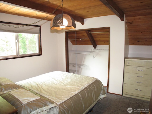 33610 J Pl, Ocean Park, WA 98640 - bedroom featuring a wooden ceiling with exposed beams, dark colored carpet, and a closet