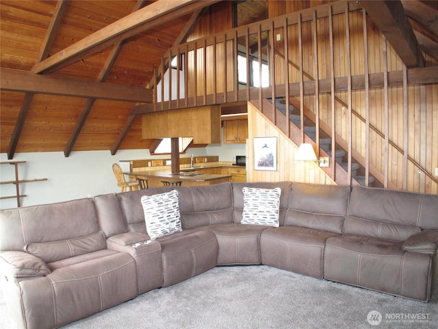 33610 J Pl, Ocean Park, WA 98640 - carpeted living room with wood ceiling and stairs