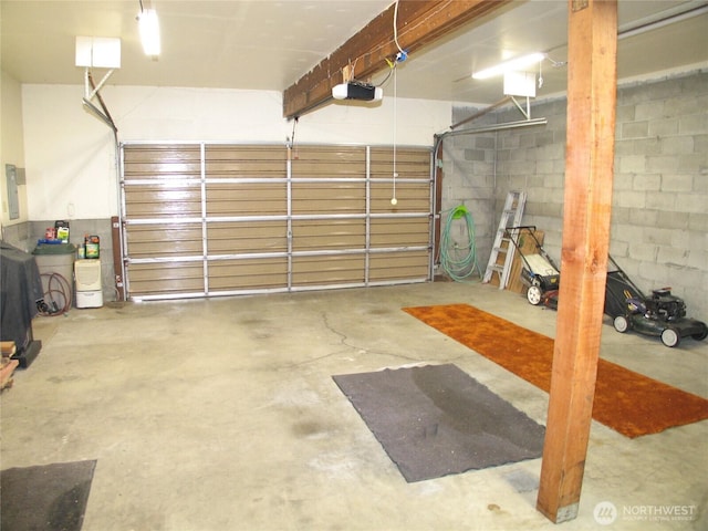 33610 J Pl, Ocean Park, WA 98640 - garage with a garage door opener, concrete block wall, and electric panel