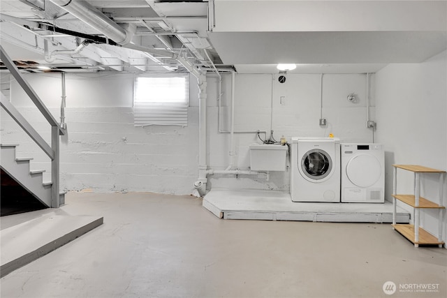 1916 11th Ave W, Seattle, WA 98119 - basement featuring washer and dryer and a sink