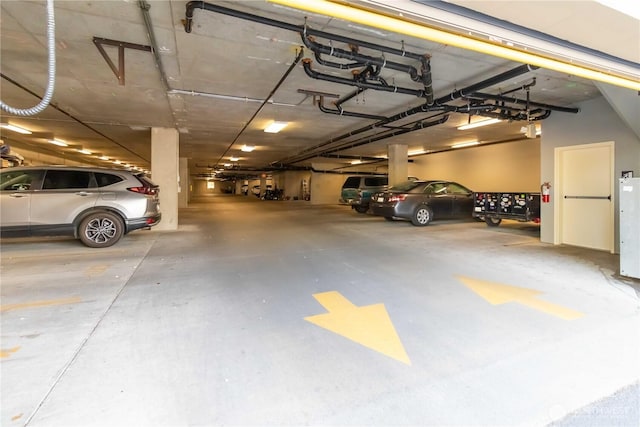 1548 River Rd Unit 301, Longview, WA 98632 - parking deck featuring a garage door opener