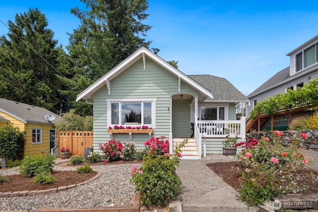4106 SW Kenyon St, Seattle, WA 98136 - bungalow-style house with a porch and roof with shingles