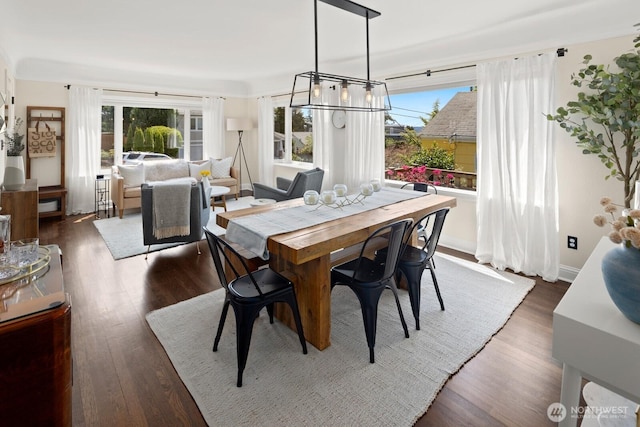 4106 SW Kenyon St, Seattle, WA 98136 - dining area with healthy amount of natural light and dark wood-style flooring