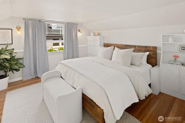 4106 SW Kenyon St, Seattle, WA 98136 - bedroom featuring wood finished floors and vaulted ceiling