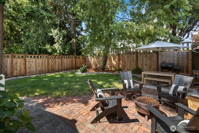 4106 SW Kenyon St, Seattle, WA 98136 - fenced backyard with a patio area and a fire pit