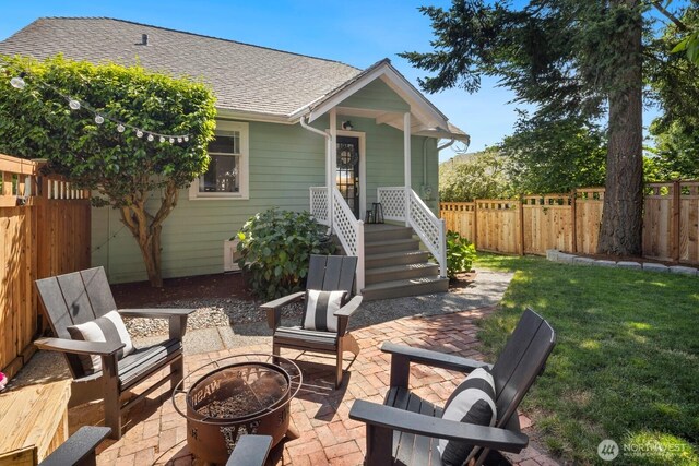 4106 SW Kenyon St, Seattle, WA 98136 - view of patio with a fire pit