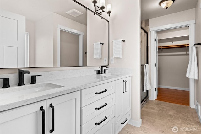 17133 123rd Ct SE, Yelm, WA 98597 - full bath featuring a shower stall, double vanity, and a spacious closet