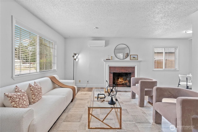 3914 N Gove St, Tacoma, WA 98407 - living room featuring a wall mounted AC, wood finished floors, a textured ceiling, and a brick fireplace