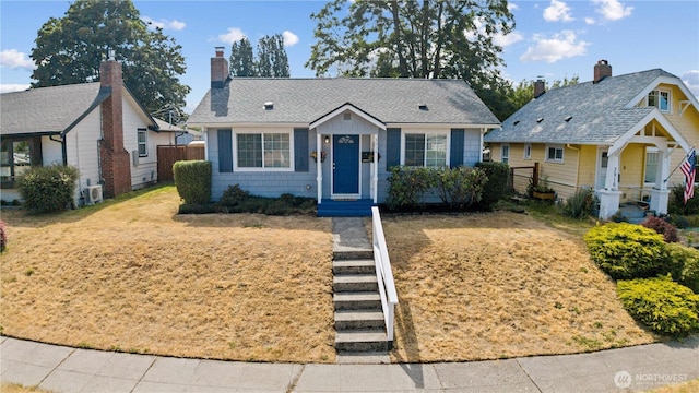 3914 N Gove St, Tacoma, WA 98407 - bungalow-style house featuring a chimney