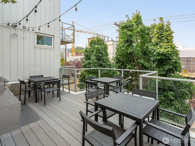 500 Mercer St Unit R325, Seattle, WA 98109 - wooden terrace featuring outdoor dining space