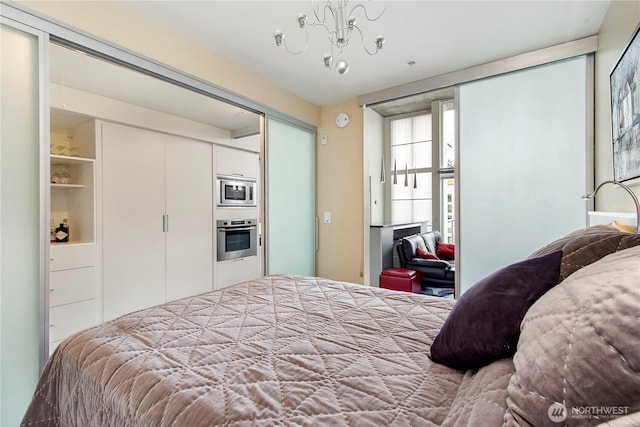 500 Mercer St Unit R325, Seattle, WA 98109 - bedroom featuring a closet and a chandelier
