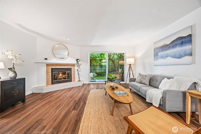9522 1st Ave NE Unit B6, Seattle, WA 98115 - living area with wood finished floors, a tiled fireplace, and recessed lighting