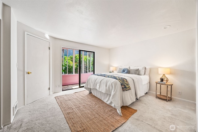 9522 1st Ave NE Unit B6, Seattle, WA 98115 - bedroom with light colored carpet and access to exterior