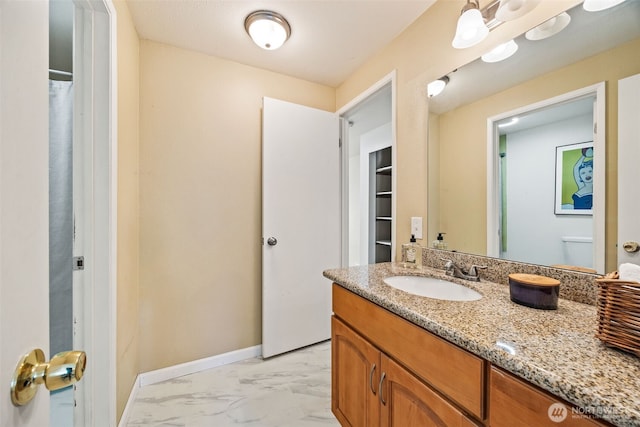 9522 1st Ave NE Unit B6, Seattle, WA 98115 - bathroom featuring vanity and marble finish flooring