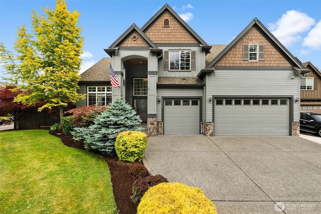 32216 Bruckners Way, Black Diamond, WA 98010 - craftsman inspired home featuring stone siding, driveway, board and batten siding, a front yard, and a shingled roof
