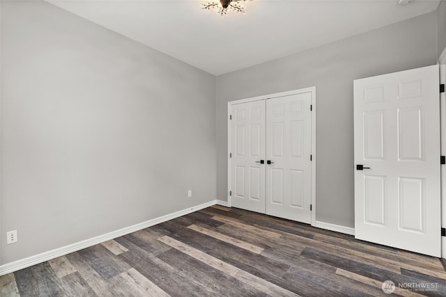 32216 Bruckners Way, Black Diamond, WA 98010 - unfurnished bedroom featuring dark wood-style flooring and a closet