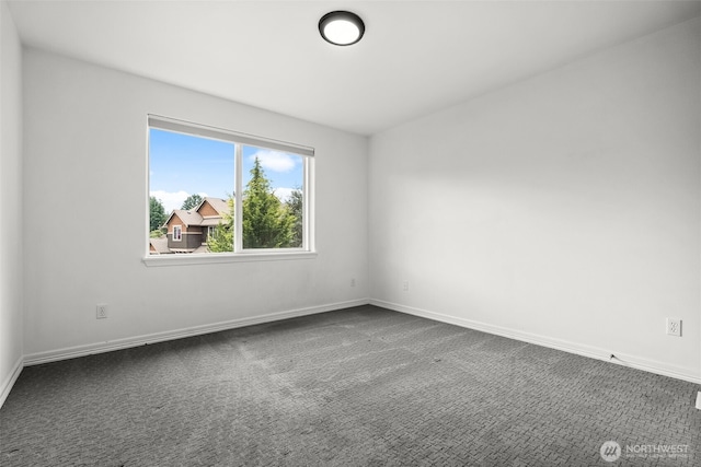 32216 Bruckners Way, Black Diamond, WA 98010 - unfurnished room featuring dark carpet and baseboards