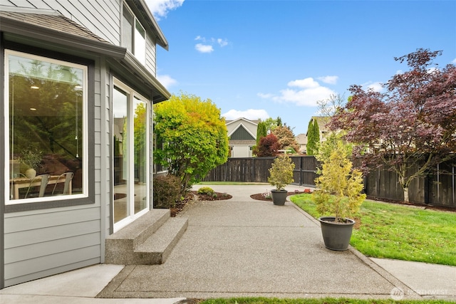 32216 Bruckners Way, Black Diamond, WA 98010 - fenced backyard featuring a patio and entry steps