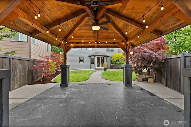 32216 Bruckners Way, Black Diamond, WA 98010 - fenced backyard featuring a gazebo, a patio, and a ceiling fan