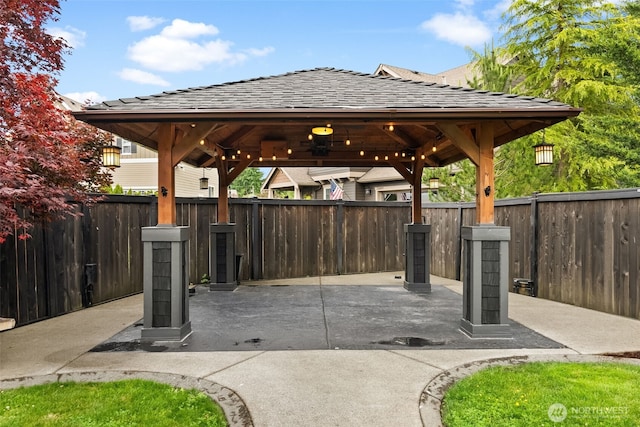 32216 Bruckners Way, Black Diamond, WA 98010 - fenced backyard featuring a gazebo and a patio area