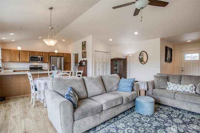 420 Point Brown Ave SE, Ocean Shores, WA 98569 - living room with light wood-style flooring, a ceiling fan, lofted ceiling, and recessed lighting