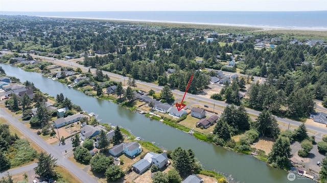 420 Point Brown Ave SE, Ocean Shores, WA 98569 - aerial view of property and surrounding area with nearby suburban area