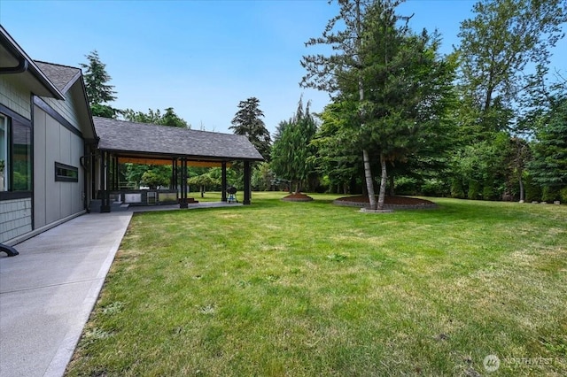 5109S 364th St, Auburn, WA 98001 - view of green lawn with a patio area