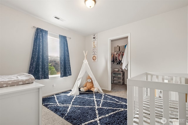 1105 Nunnally Ave NW, Orting, WA 98360 - carpeted bedroom featuring baseboards and a closet