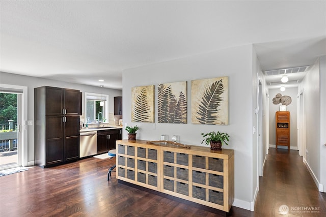 134 Robin Ln, Port Ludlow, WA 98365 - hall featuring dark wood-style floors and a sink