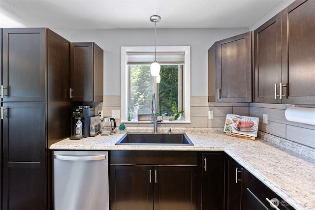 134 Robin Ln, Port Ludlow, WA 98365 - kitchen featuring stainless steel dishwasher, decorative backsplash, and dark brown cabinets