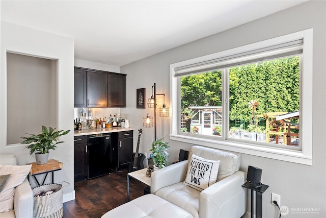 134 Robin Ln, Port Ludlow, WA 98365 - living area featuring a dry bar and dark wood-type flooring
