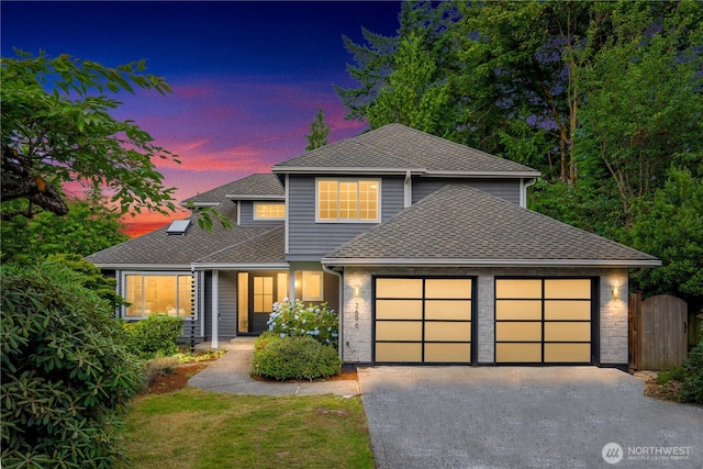 3696 169th Ave NE, Bellevue, WA 98008 - view of front of home featuring an attached garage, driveway, roof with shingles, and a gate