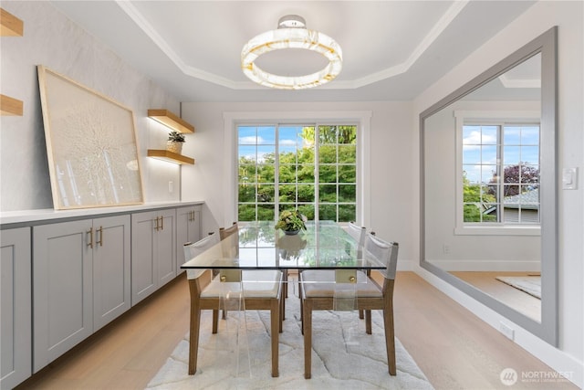 3696 169th Ave NE, Bellevue, WA 98008 - dining area with light wood-style flooring and a raised ceiling