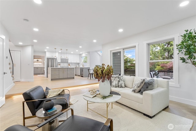 3696 169th Ave NE, Bellevue, WA 98008 - living room with recessed lighting and light wood-type flooring