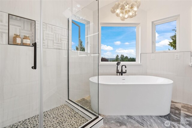 3696 169th Ave NE, Bellevue, WA 98008 - bathroom featuring a chandelier, a freestanding tub, and a shower stall