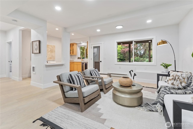 3696 169th Ave NE, Bellevue, WA 98008 - living room featuring beverage cooler, recessed lighting, light wood-style floors, and baseboard heating