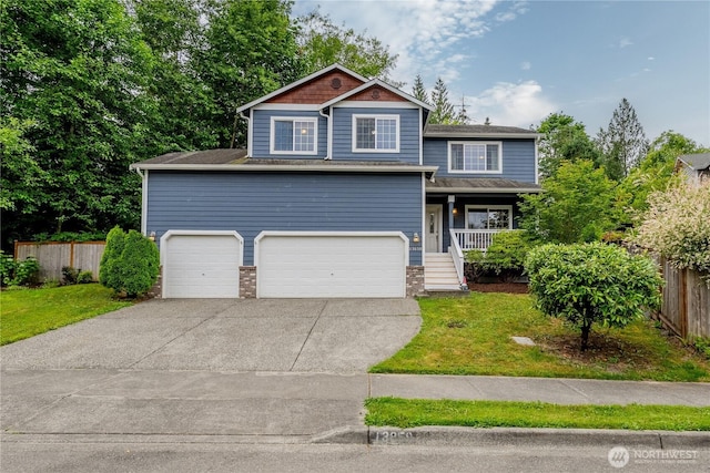 13858 Dogwood Ct, Sultan, WA 98294 - view of front of home with driveway, a porch, a garage, and roof with shingles