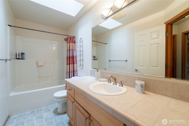 13858 Dogwood Ct, Sultan, WA 98294 - bathroom featuring a skylight, vanity, and shower / bath combo with shower curtain