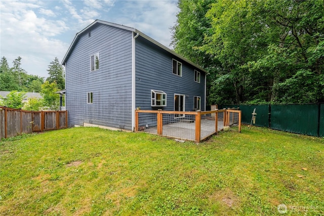13858 Dogwood Ct, Sultan, WA 98294 - back of property featuring a fenced backyard and a patio area