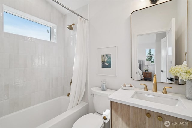 8227 Latona Ave NE, Seattle, WA 98115 - bathroom with healthy amount of natural light, shower / bath combo with shower curtain, and vanity